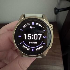 Garmin Gold and White Smartwatch with Digital Display